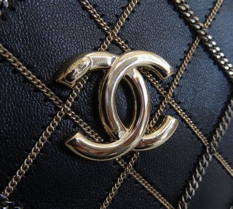 gold chanel clutches 2019|Chanel black quilted clutch.